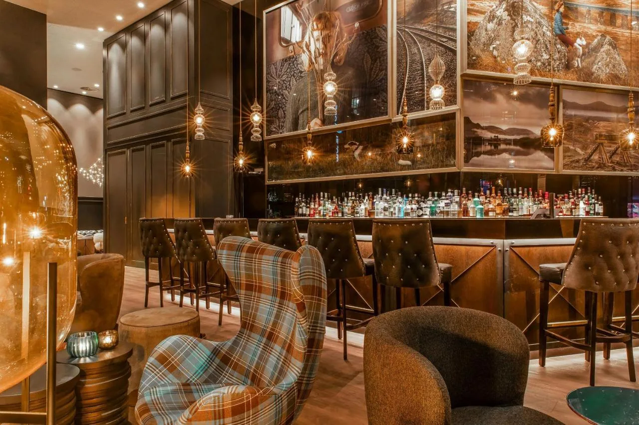 Bar with tartan armchairs
